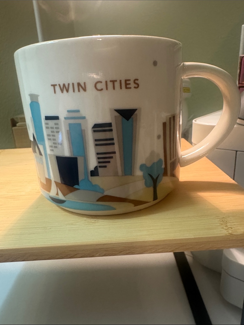 Starbucks Twin Cities White Mug with Blue and Brown Skyline